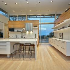 Spacious Contemporary Kitchen With Sleek White Cabinetry