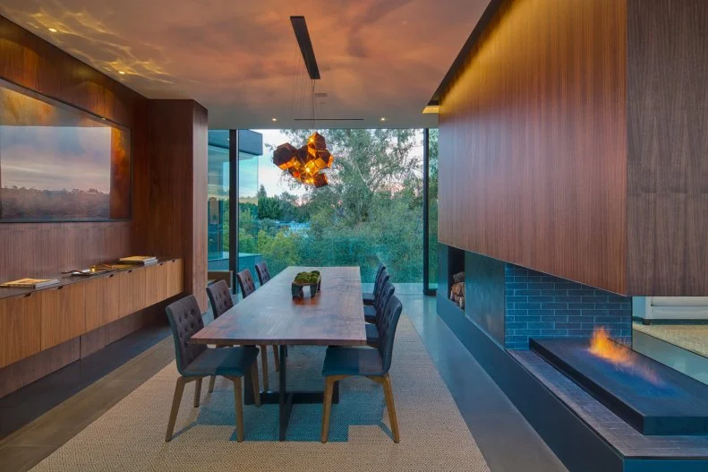 Dining Room With Wooden Walls 