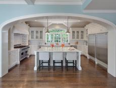 Traditional Chef's Kitchen With White Cabinets, Large Island