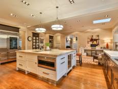 Neutral Open Concept Kitchen With White Square Island and Two Pendants