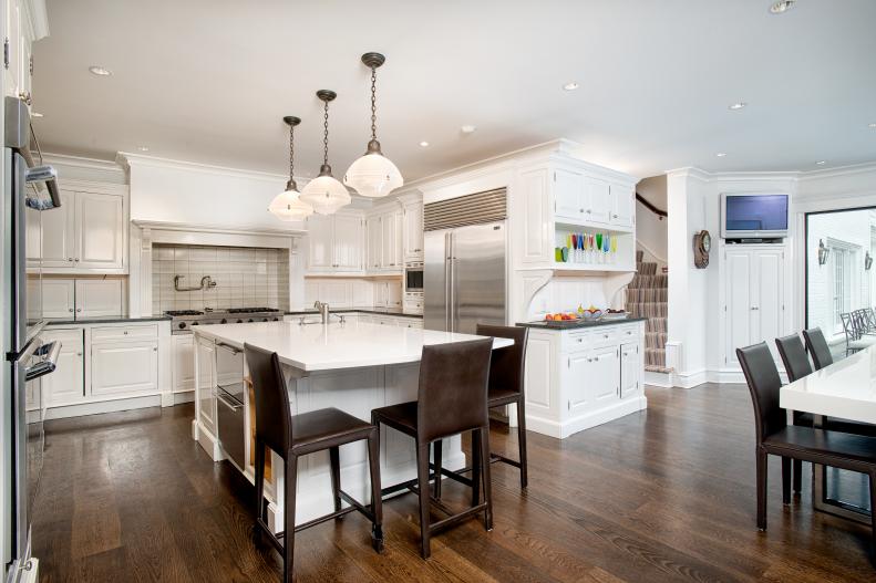 Transitional White Eat-In Kitchen With White Island & Brown Barstools