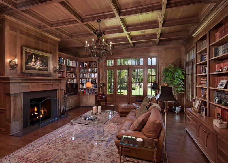 Abundant Library and Cozy Fireplace in Elegant Living Room 