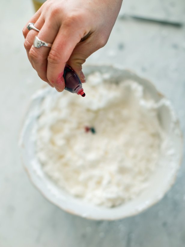 Add food coloring (4 drops blue/8 drops red for a pale lavender), desired amount of essential lavender oil and approximately 2-3 tablespoons dried lavender buds.