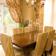 Intimate Cottage Style Dining Room with Dark Stained Table