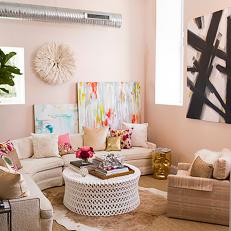 Exposed Air Duct and Abstract Artwork in Contemporary Living Room 