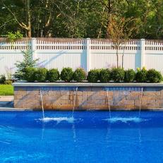 Waterfall Filtration System Feature in Backyard Pool