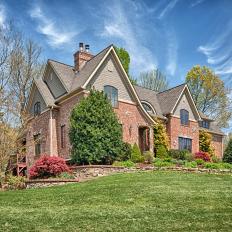 Stunning Tudor Features Red Brick & Terraced Landscaping