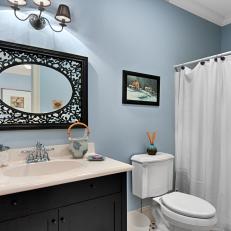 Blue Bathroom Feels Fresh With Black and White Accents