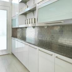 Modern White Kitchen with Silver Subway Tile Backsplash