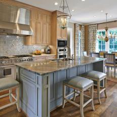 Traditional Kitchen with Stainless Steel Appliances and Painted Island