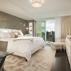 Elegant Contemporary Bedroom Features Plush Linens & Contrasting Elements
