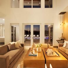 Grand Contemporary Living Room Features Two-Story Ceilings