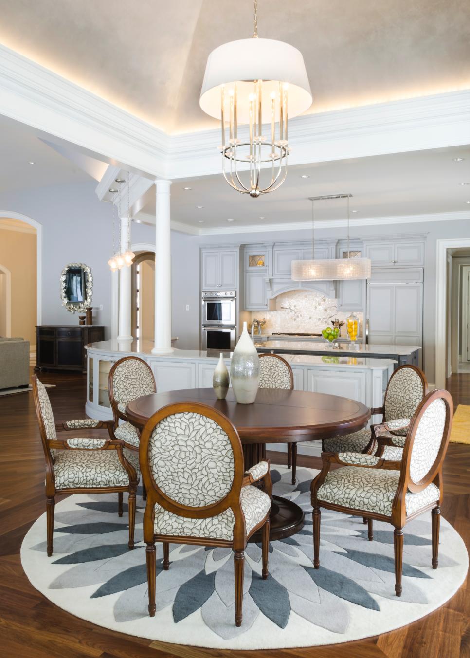 Gray & White Dining Room With Floral Accents, Eye-Catching Chairs