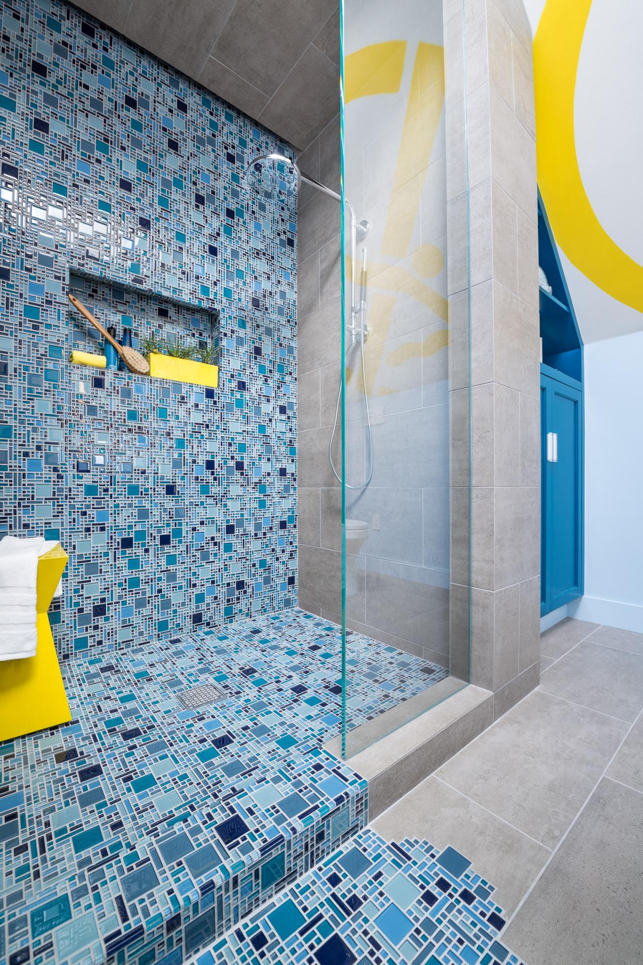 Blue Mosaic Tile Spills From Shower Onto Floor to Create ...