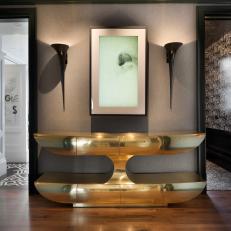 Master Suite Entry Features Video Art Installation and Gold Console