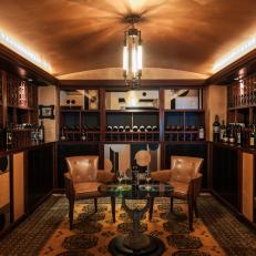 Graphic Cabinetry Designs, Metallic Ceiling Create Art Deco Style in Wine Cellar