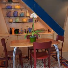 Colorful Contemporary Breakfast Nook with Bold Accent Wall 