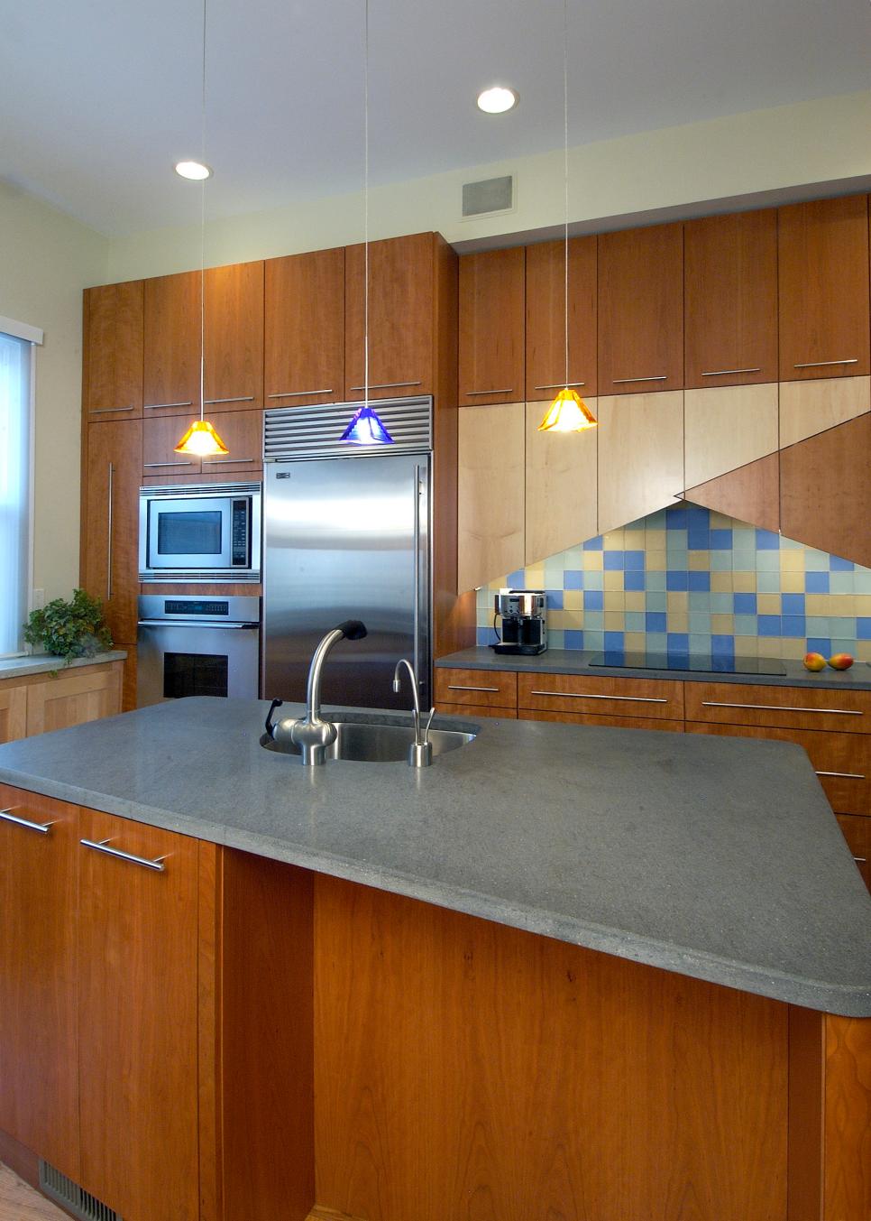 Stylish Modern Kitchen Features Stone Gray Countertops | HGTV