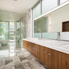 Zebra Wood Cabinets and White Countertops in Gray and White Modern En Suite