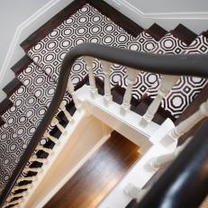 Modern Stairs with Graphic Brown and White Rug 
