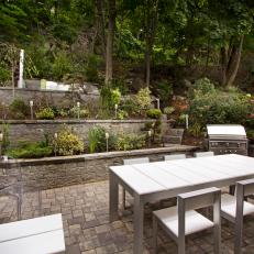Back Patio With Tiered Garden & Modern Dining Table and Chairs