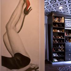 Women's Shoe Storage Unit and Female Figure Painting Under Purple and Black Patterned Ceiling 