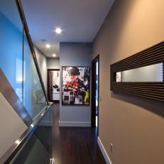 Contemporary Hallway With Glass & Metal Stair Railing