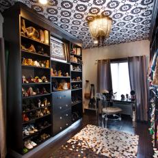 Walk-In Closet With Patterned Ceiling, Pixelated Rug and Large Shelving Units