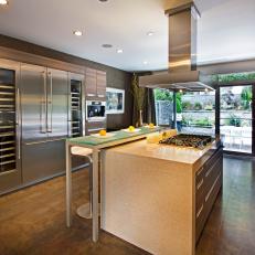 Contemporary Kitchen With Stainless Hood Above Island
