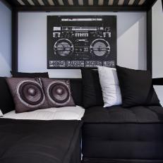Cozy Black and White Sectional With Speaker Throw Pillows