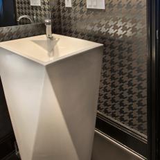Bathroom With Silver Houndstooth Walls & Modern Pedestal Sink