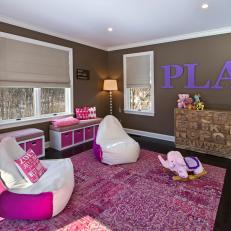 Girl's Playroom With Pink and White Oversize Beanbag Chairs, Benches With Drawer Storage Large Patterned Floor Rug 