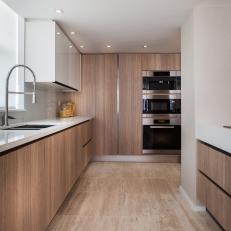 Neutral Modern Chef's Kitchen With Marble Floor
