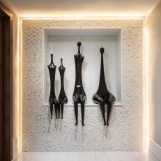 Contemporary Sculptures Bring Life to Hallway