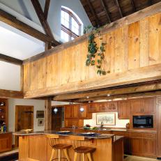 High-ceilinged Home Featuring Rustic, Wood Kitchen and Dark Wood Ceilings