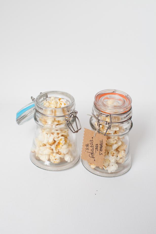Guests will be so happy they &quot;popped&quot; by your party after receiving kettle corn favors inspired by a popular county fair snack. Take it one step further by serving them in vintage weck jars.