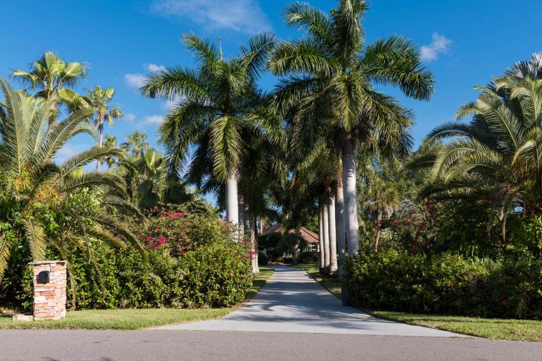 This Merritt Island home will be completely gutted and remodeled during renovations by HGTV. Pictured is the driveway entrance before construction