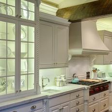 Cozy Cottage Style Kitchen with Lighted Cabinetry