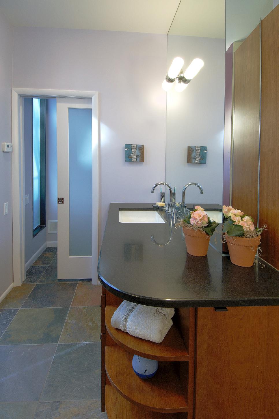 Stylish Modern Vanities Provide Storage in Eclectic Bathroom | HGTV