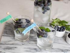 Save yourself the trouble of mixing up cocktail glasses (<i>again!</i>) at your next party by creating personalized drink labels with each guests' name. All that will be left to say is "Cheers!"