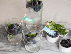 Put a spin on a traditional mojito by incorporating summer berries for a refreshing and fruity flavor.