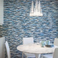 Small Dining Room With Mosaic Tile Accent Wall