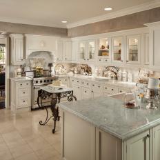 Large Country French Kitchen with Marble Countertops and Tile Floors