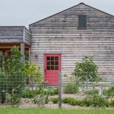 Weathered Ranch Exterior With Red Door