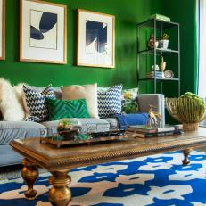Vibrant Green Living Room With Bright Blue Accents and Funky Patterns