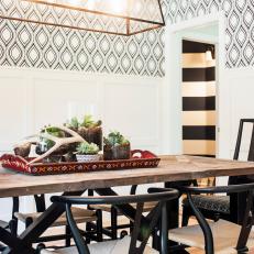 Black and White Dining Room With Patterned Wallpaper