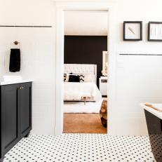 Black and White Master Bathroom with Double Vanity and Soaking Tub