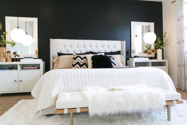 Bedroom With Black Accent Wall and White Furniture