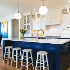 White Kitchen with Blue Cabinetry
