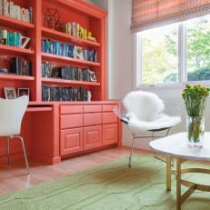 Modern White Study with Stunning Coral Bookshelf